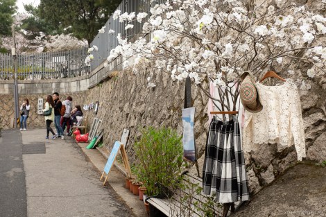 Side alley with clothing stores.