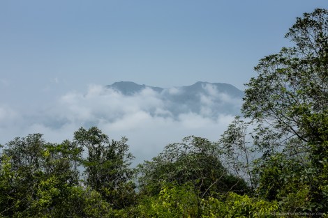 Low clouds and a view of Tai Tung Shan and Yi Tung Shan peaks in the distance.