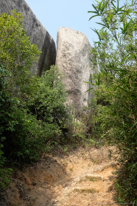 A giant split boulder along the mountain bike trail.